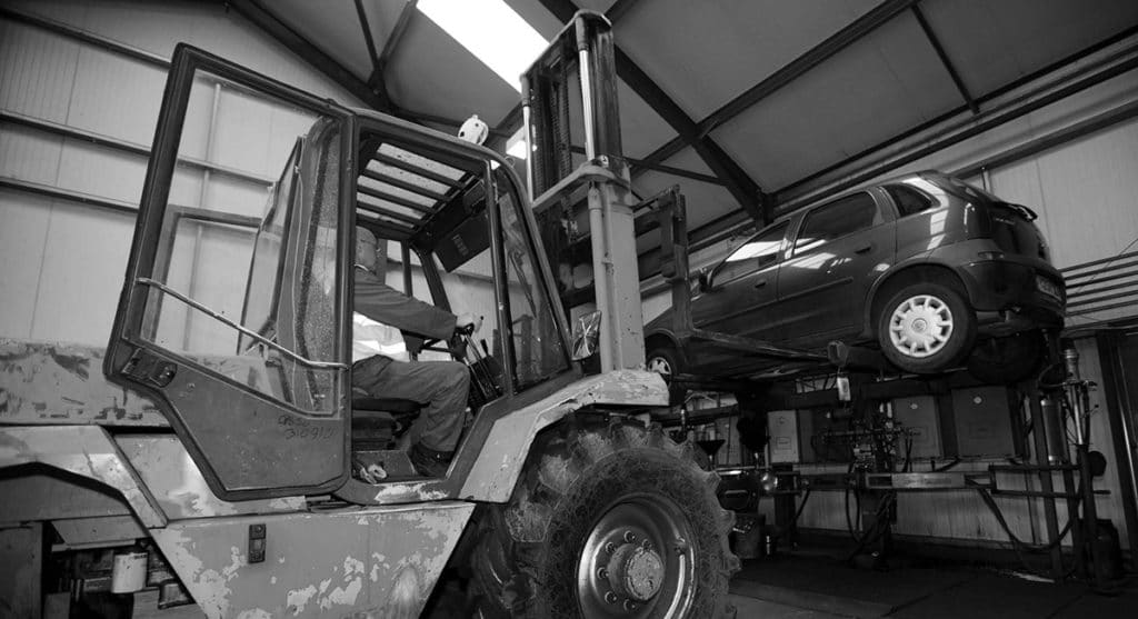 A car being prepared for disposal.